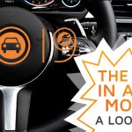 A car's dashboard, with the number 2019 stuck to it, symbolizing the automotive market of the year 2019 in this review article.